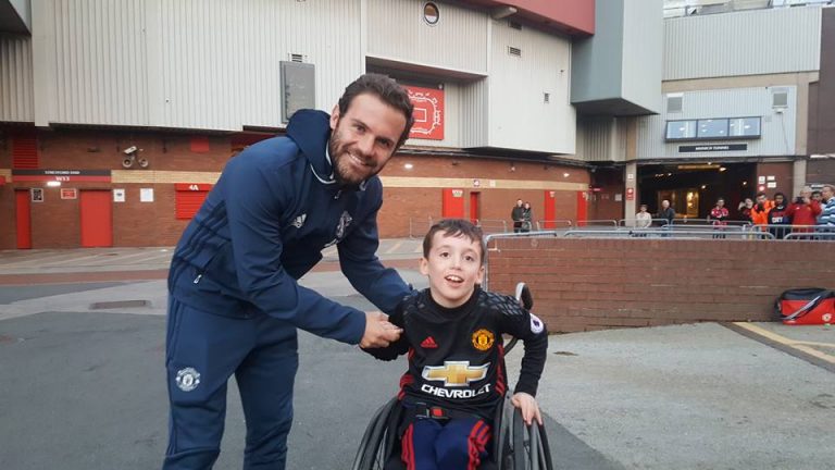 Juan Mata with MUDSA poster boy Alex Nield