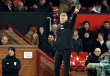 Ole Gunnar Solskjaer points the way in front of Old Trafford dugout
